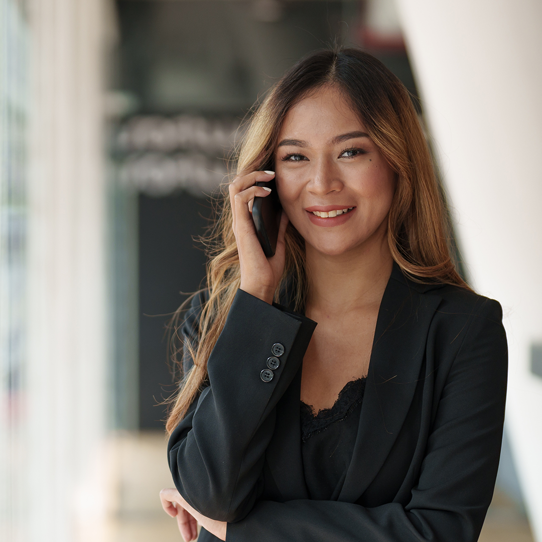 entrepreneur-young-asian-woman-making-call-on-mobi-2025-01-10-05-56-41-utc_cut