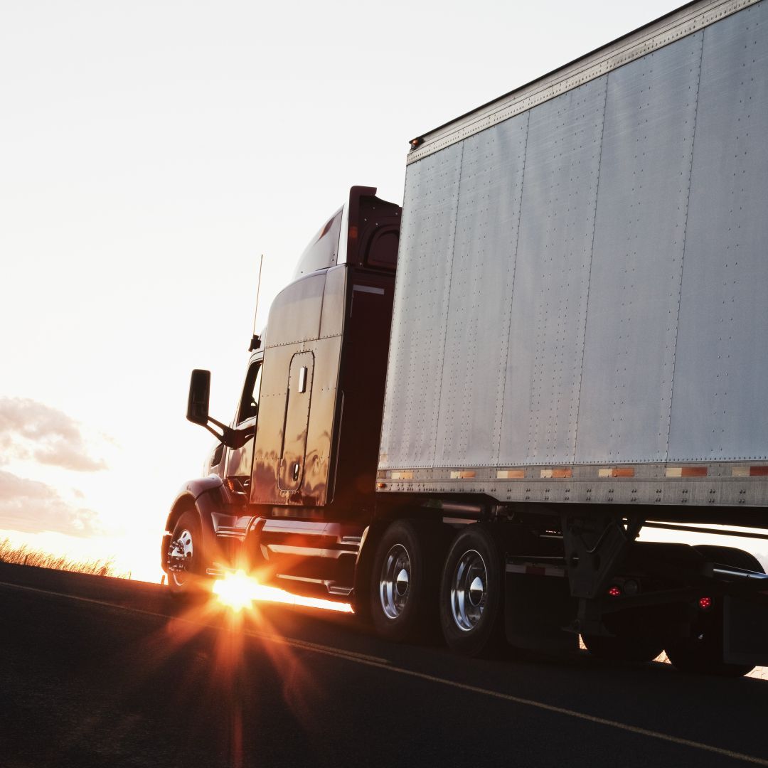 silhouette-of-a-commercial-truck-driving-on-a-hig-2026-01-09-08-33-01-utc_low silhouette-of-a-commercial-truck-driving-on-a-hig-2026-01-09-08-33-01-utc_low